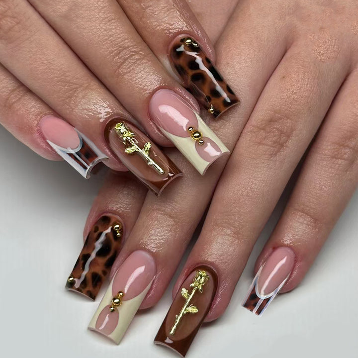 Artificial nails with luxurious embellishments and animalistic design Kalsten