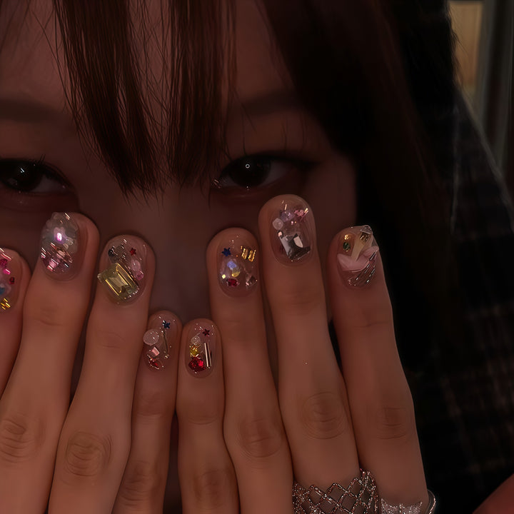 Artificial nails with sparkling crystal accents Kalsten