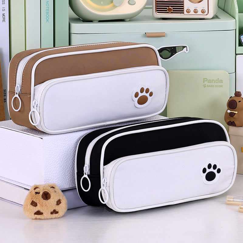 Pencil case with double compartment design and playful paw print motif Kalsten