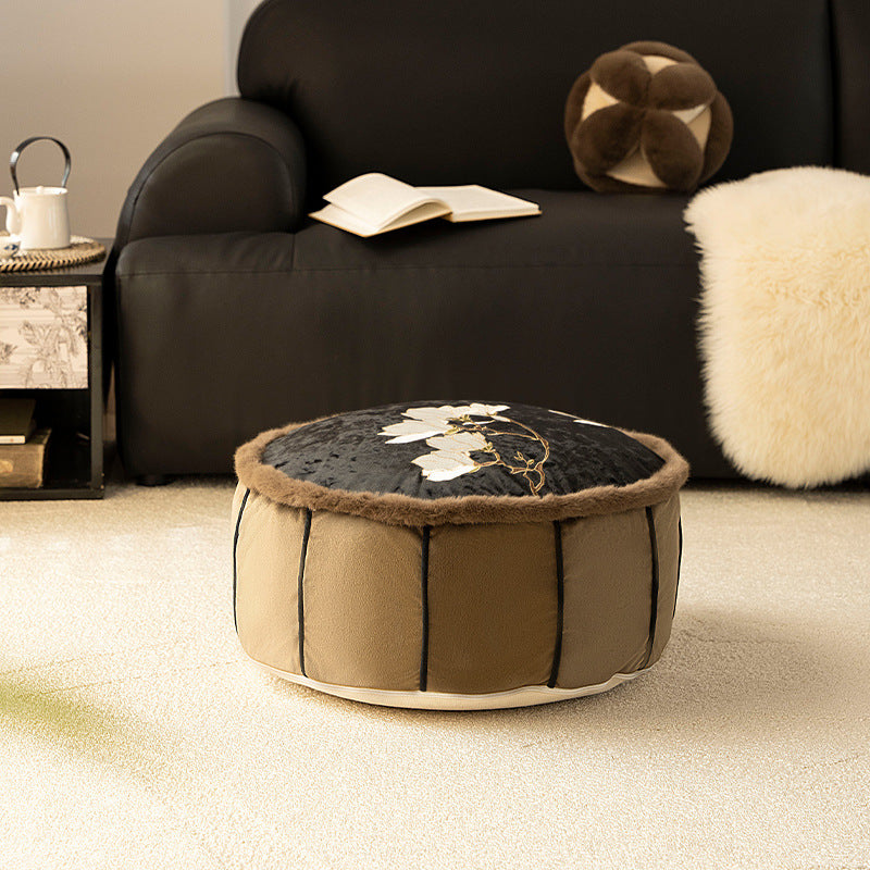 Round upholstered velvet floor cushion pouf with faux fur trim and handle Kalsten