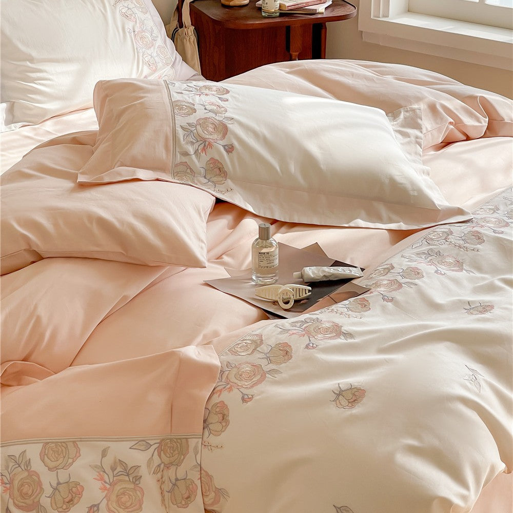 Premium bedding set made of cotton satin with floral border embroidery and reversible function
