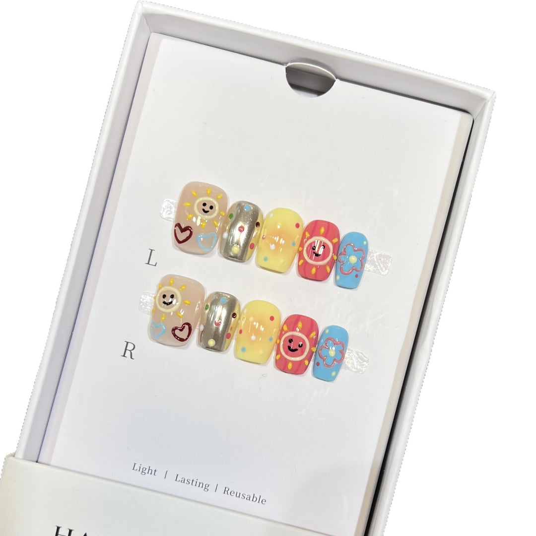 Whimsical Press-On Nail Art Set with Smiley Faces and Floral Designs Kalsten