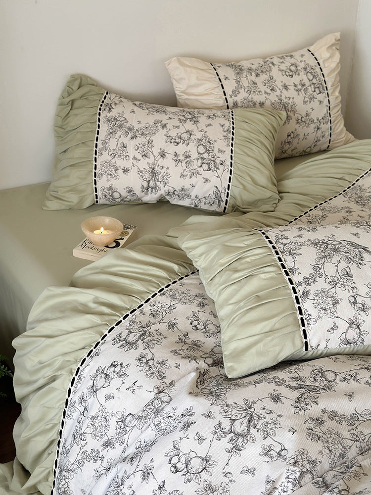 Romantic cotton percale bedding set with fine toile print and ruffle trim