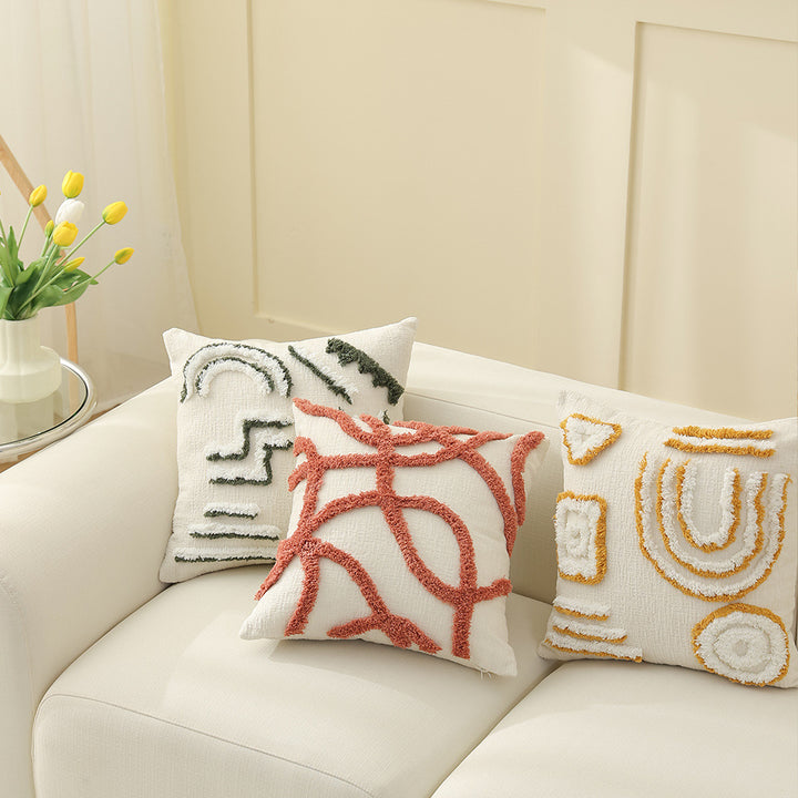 Geometric tufted sofa cushion with textured loop appliqué and removable cover Kalsten