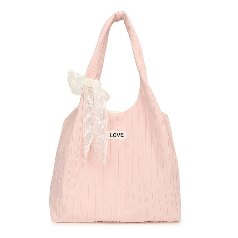 Leisure bag with structured design and playful scarf Kalsten