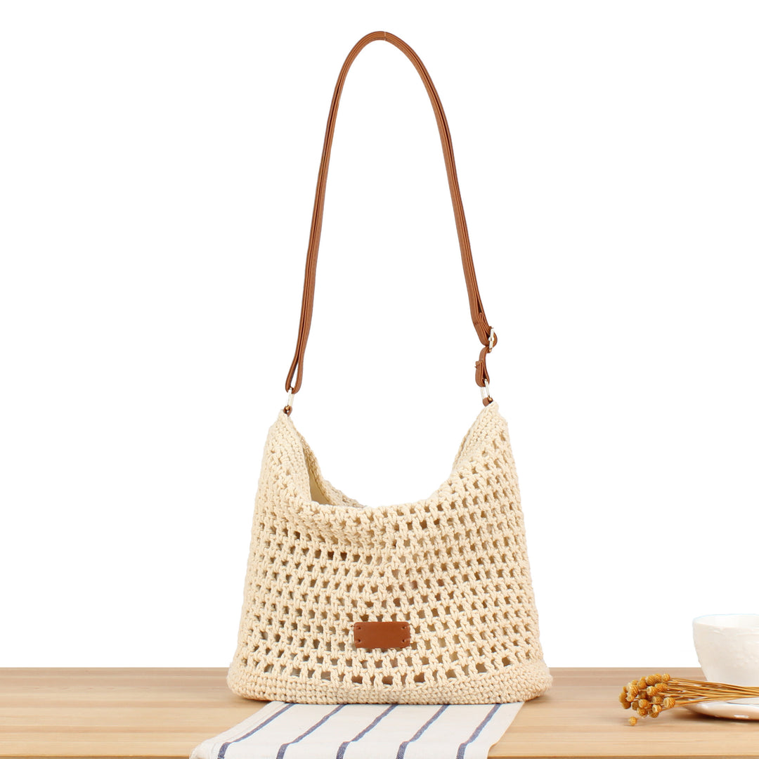 Handbag made of hand-knotted natural material with leather accents Kalsten