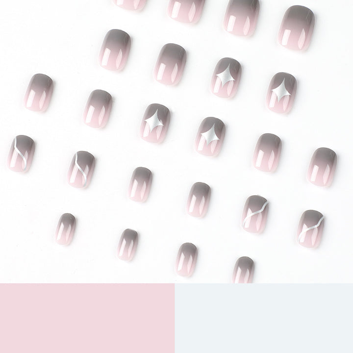 Artificial nail art with elegant ombre design and charming accents Kalsten