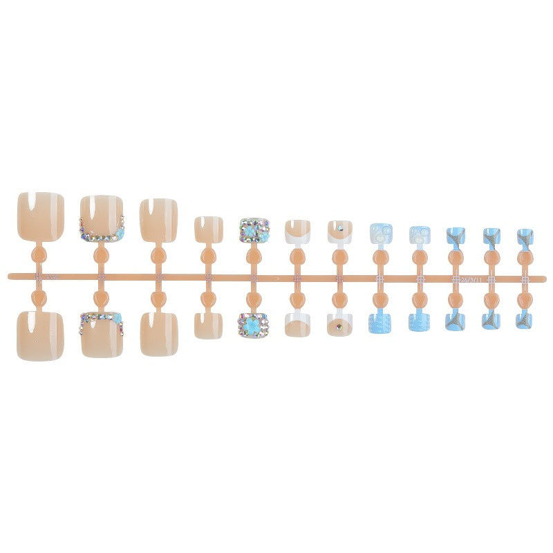 Glamorous artificial nail creation with elegant embellishments Kalsten