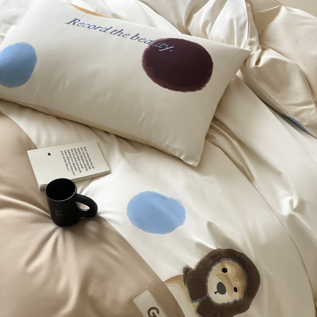 Children's bedding set made of cotton satin with playful animal and polka dot print