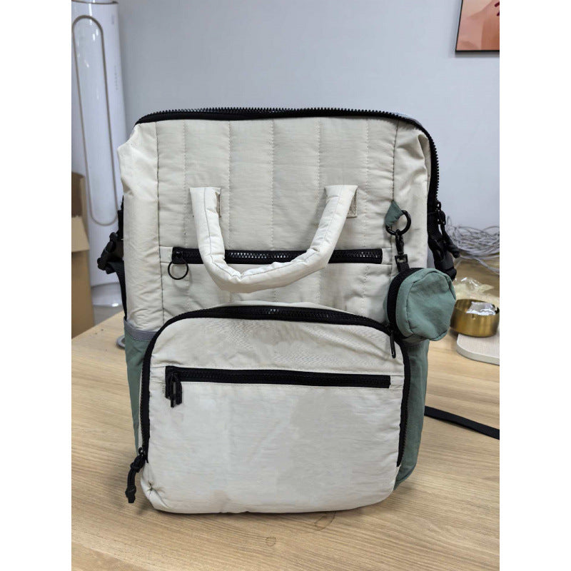 Multifunctional backpack with padded carrying handles and multiple compartments Kalsten