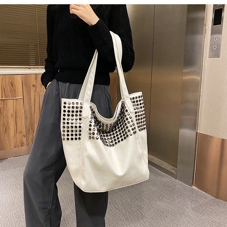 Fashionable shoulder bag with stylish rivet details Kalsten