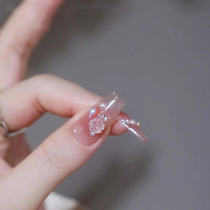 Artificial nails with elegant gradient and glitter accents Kalsten