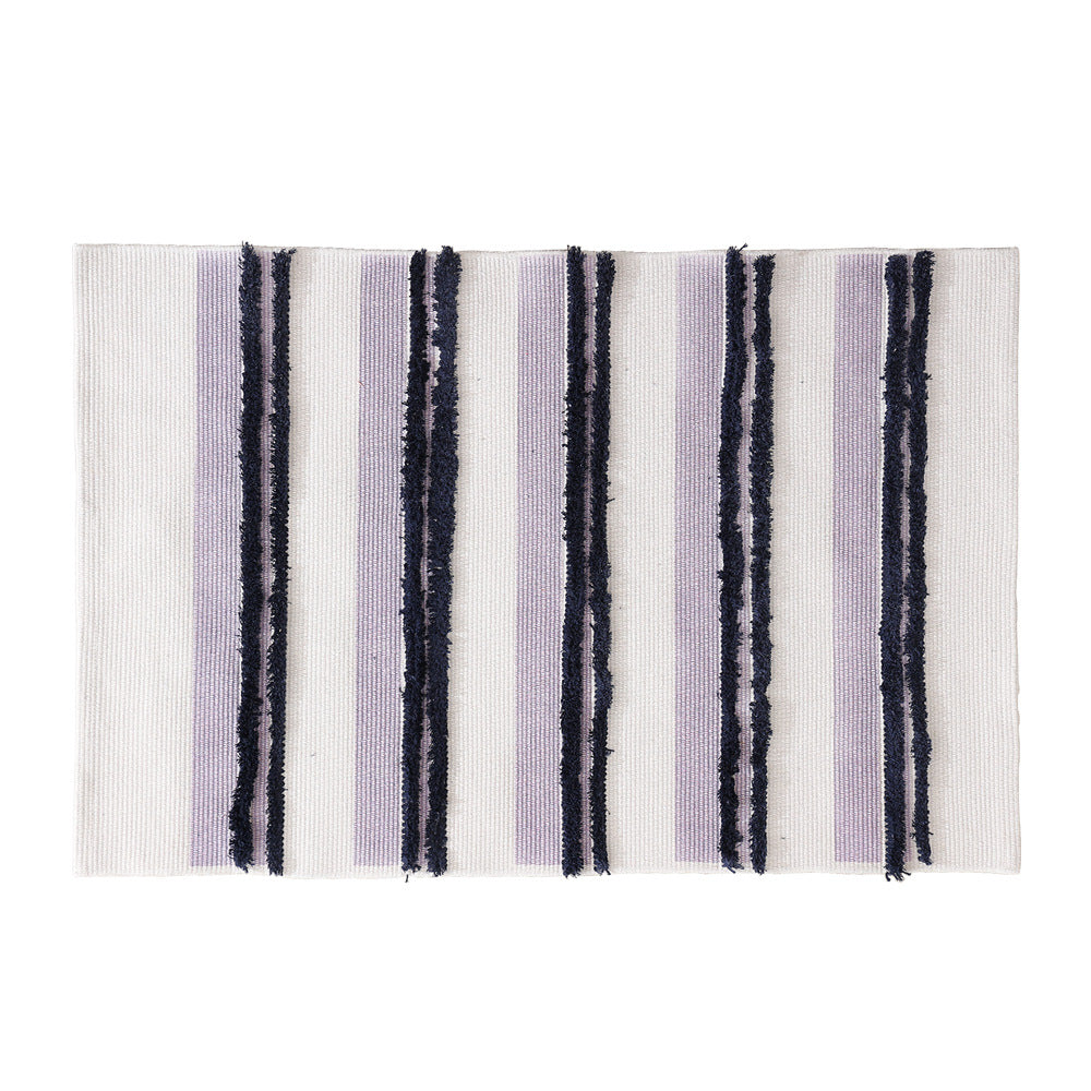 Rectangular flat-woven cotton rug with raised tufted stripes