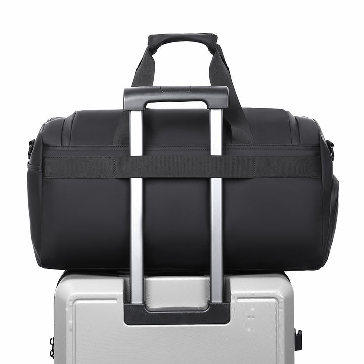 Sporty travel bag with extendable main compartment and multiple organizing pockets Kalsten