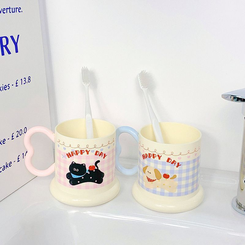 Ceramic mug with playful puppy motif Kalsten