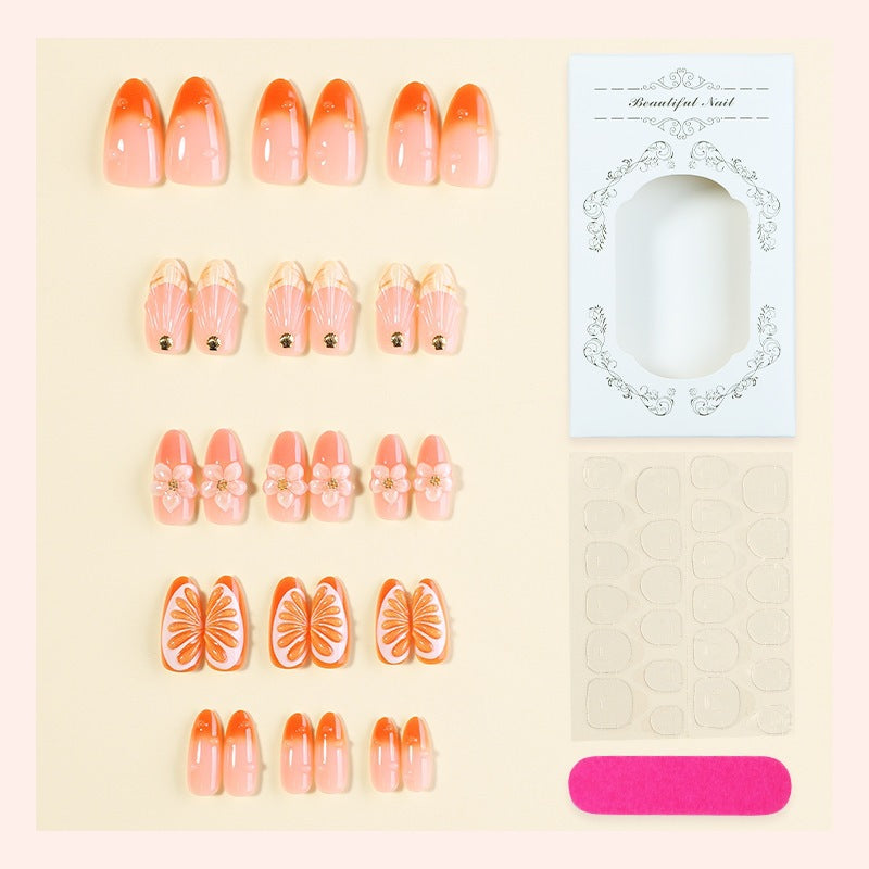 Artificial nail set with floral designs and glitter accents Kalsten