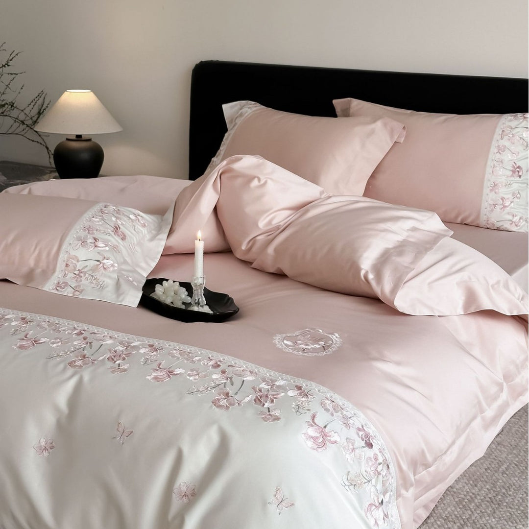 Luxurious satin bedding set with floral stitched border