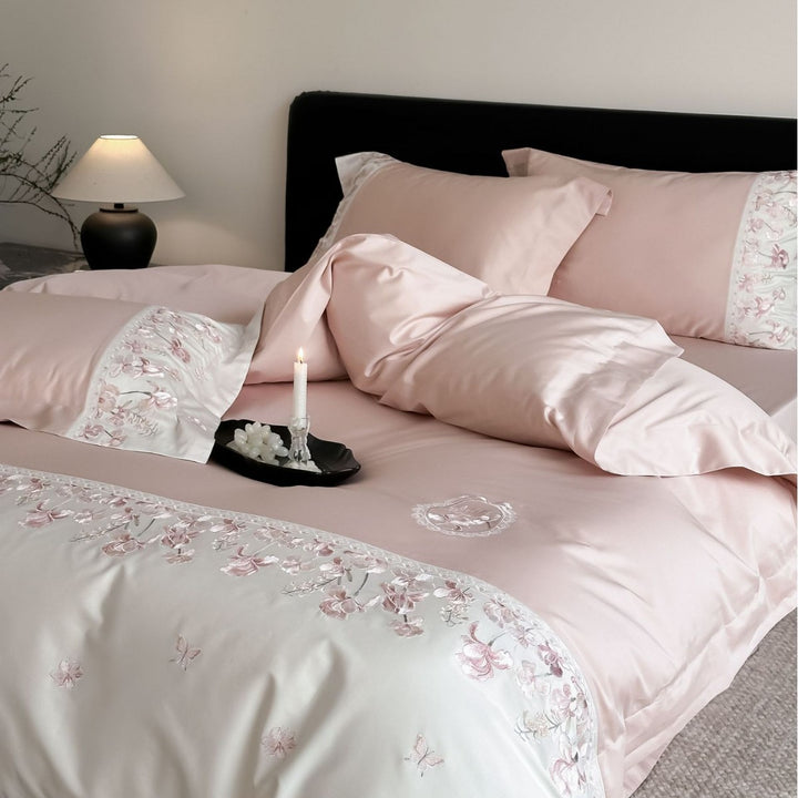 Luxurious satin bedding set with floral stitched border