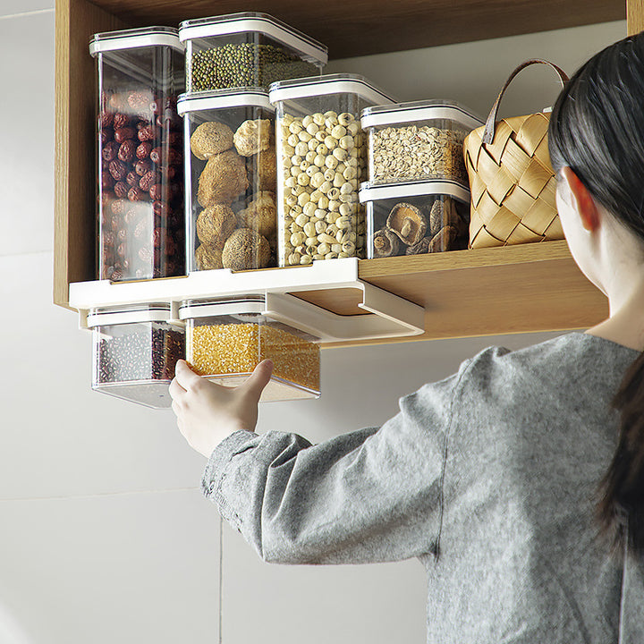 Three-fold storage container with removable inserts and pouring lid