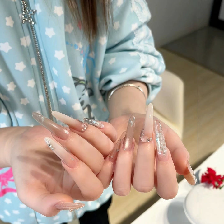 Elegant Stiletto Nail Extensions with Crystal Accents