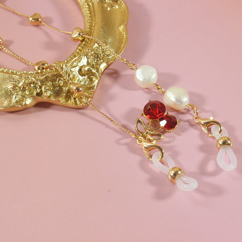 Elegant jewelry ribbon with pearls and silver accents Kalsten