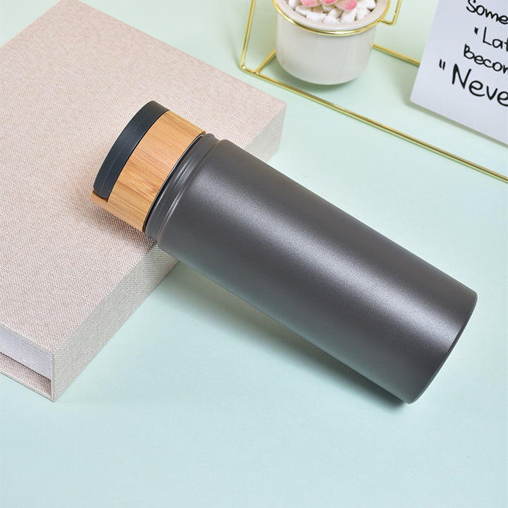 Ladies stylish and versatile stainless steel drinking bottle with bamboo lid Kalsten