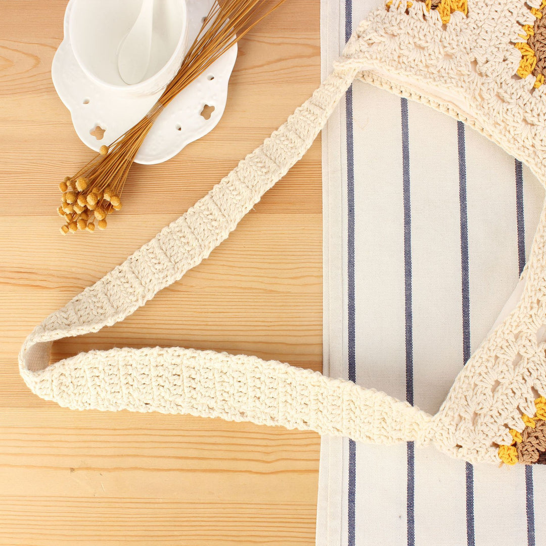 Crochet shoulder bag with playful sunflower pattern Kalsten