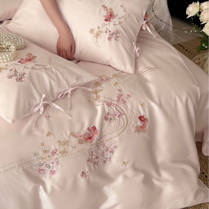Embroidered satin bedding set with ribbon ties and delicate floral embroidery Kalsten