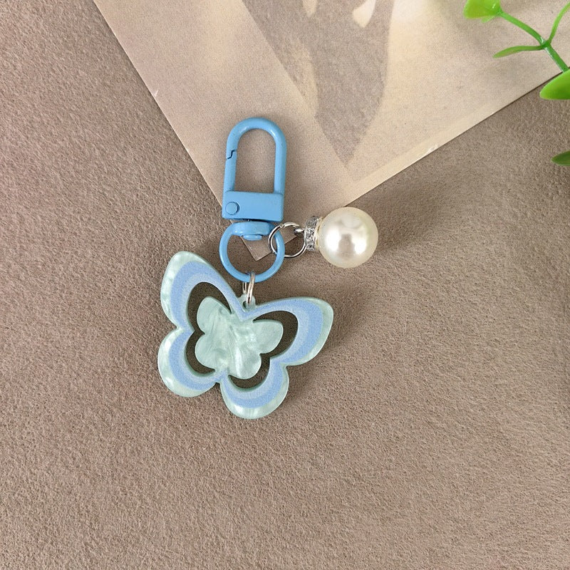 Keychain with butterfly and pearl accent Kalsten