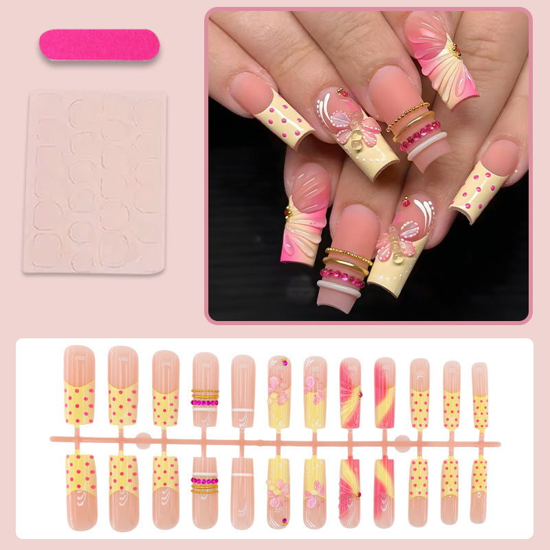 Artificial nail set with romantic flowers and playful accents Kalsten