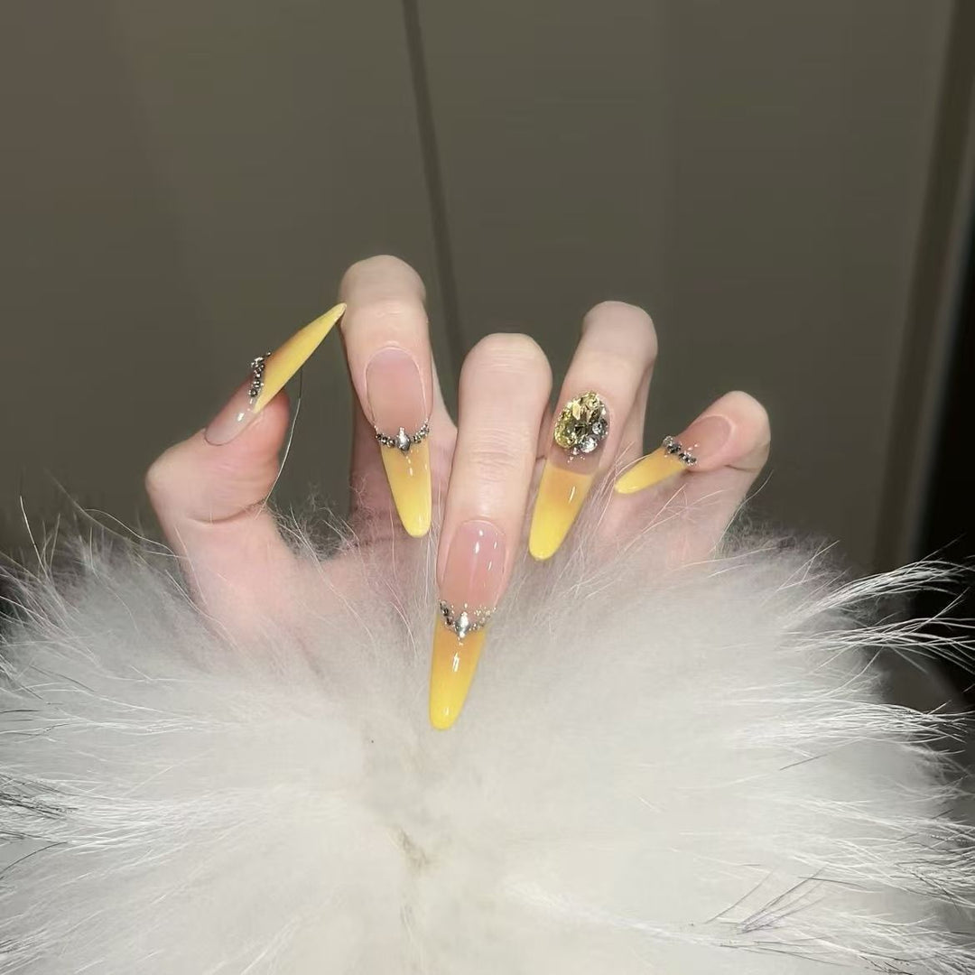 Stiletto Nail Extensions with Decorative Accents