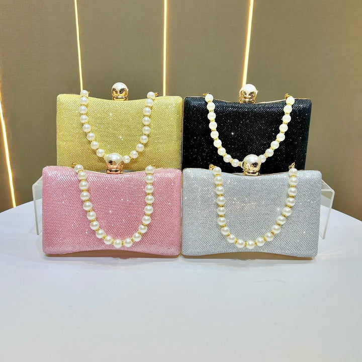 rhinestone-embellished evening clutch