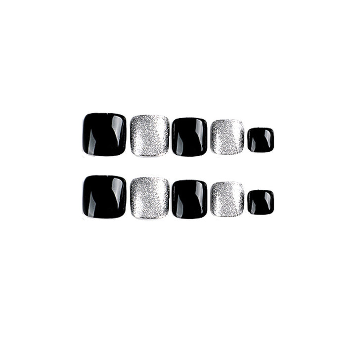 Artful toenail art with glitter and black design Kalsten