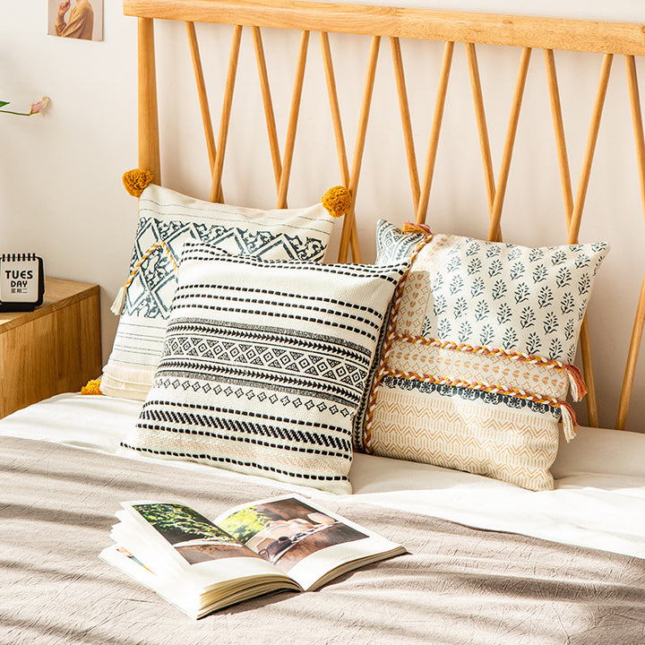 Square decorative pillow cover in Boho block print with braided tassels