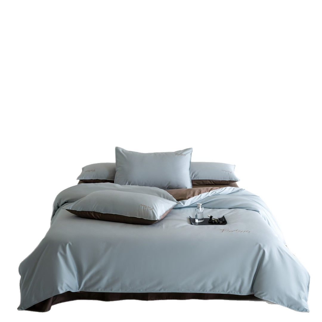 Reversible satin bedding set with fine tone-on-tone embroidery