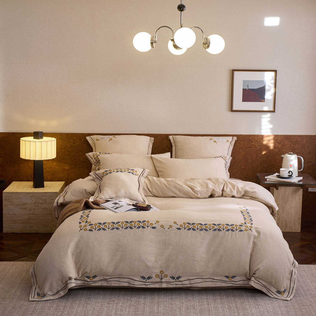 Bedding set with finely embroidered floral border design