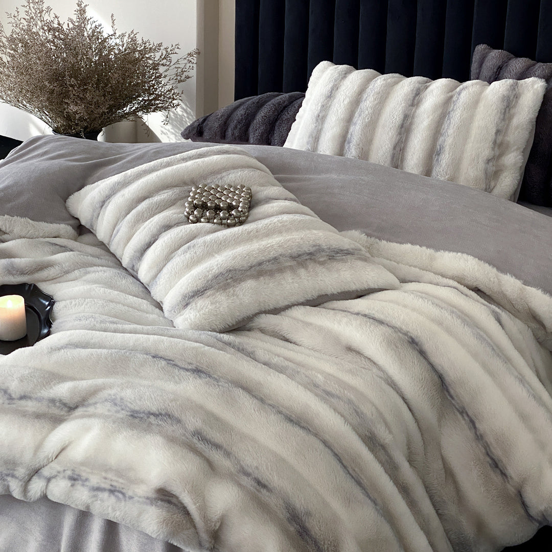 Luxury faux fur throw and cushion set with striped texture
