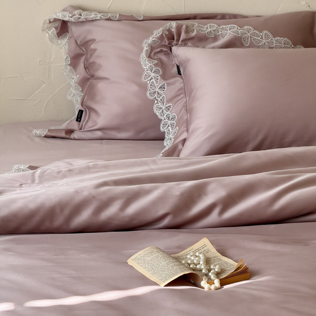 Luxurious cotton satin bed linen set with fine lace border