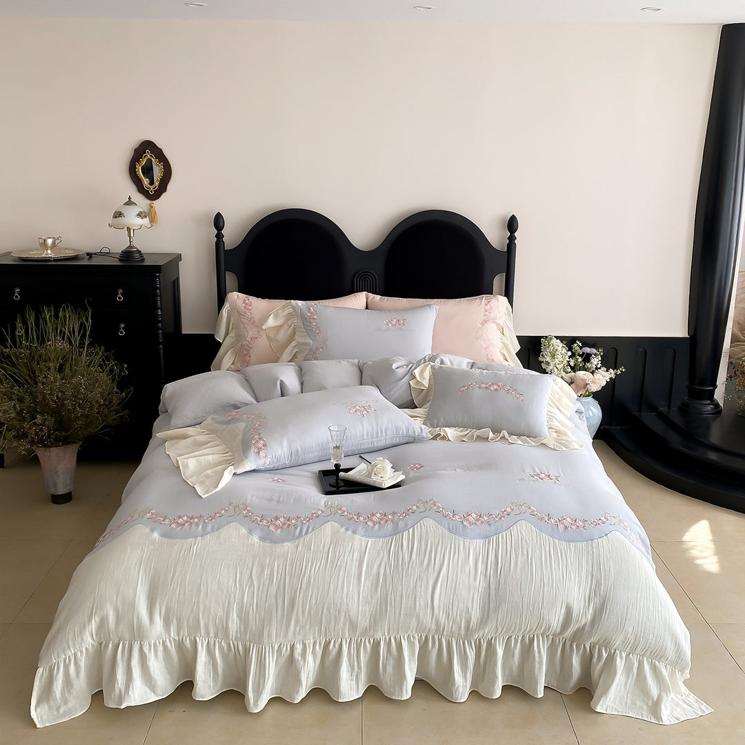 Vintage-inspired bedding set made of cotton-linen with delicate rose embroidery and gathered frill