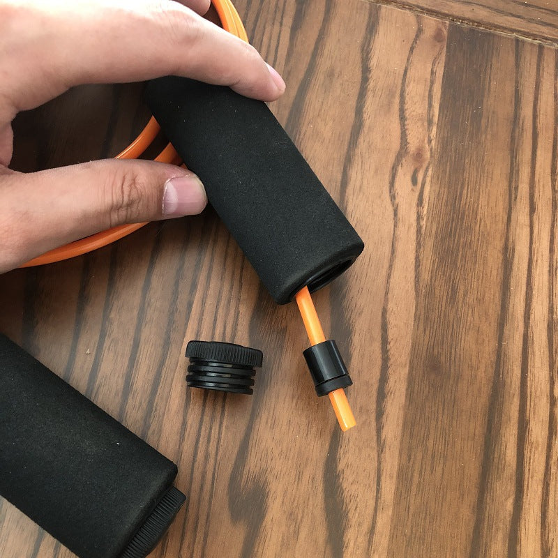 Jump rope with non-slip grips and adjustable cord Kalsten