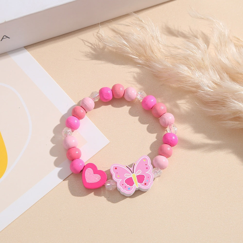 Playful bracelet with heart and butterfly charms Kalsten