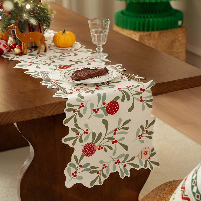 Festive table runner with wavy edge and botanical Christmas motif