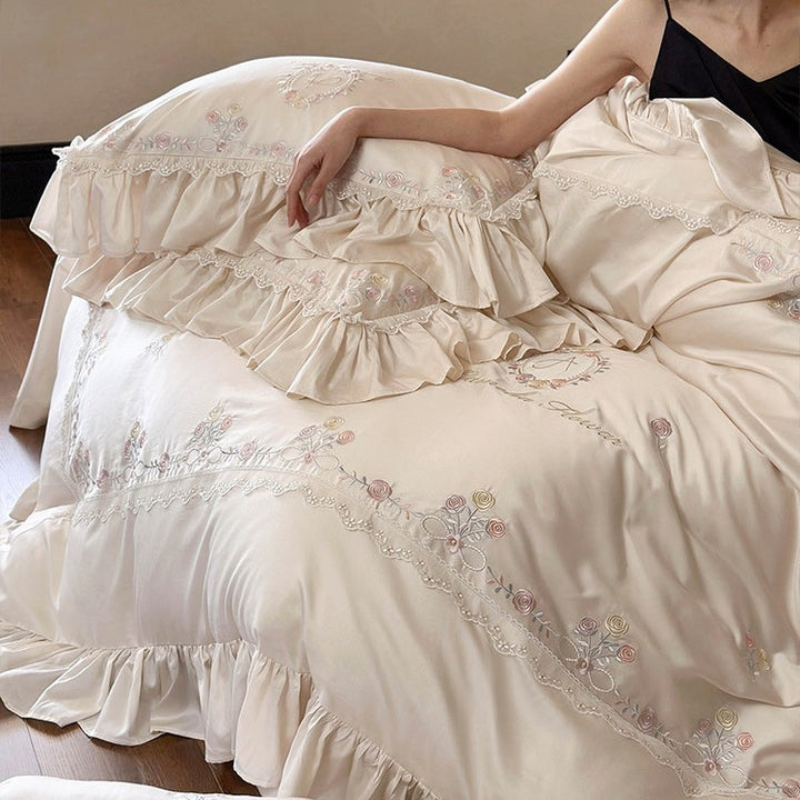 Luxurious satin bedding set with fine floral embroidery and ruffles