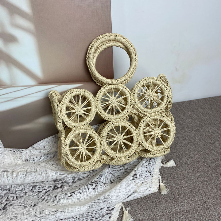 Artisan woven basket bag with striking wheel pattern Kalsten