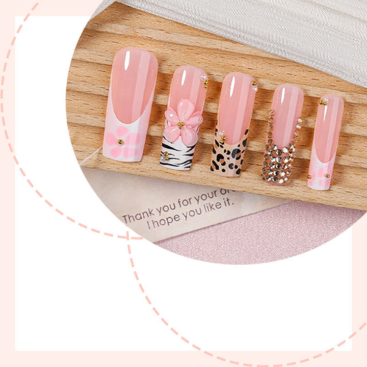 Glamorous acrylic nail set with floral and animal designs Kalsten