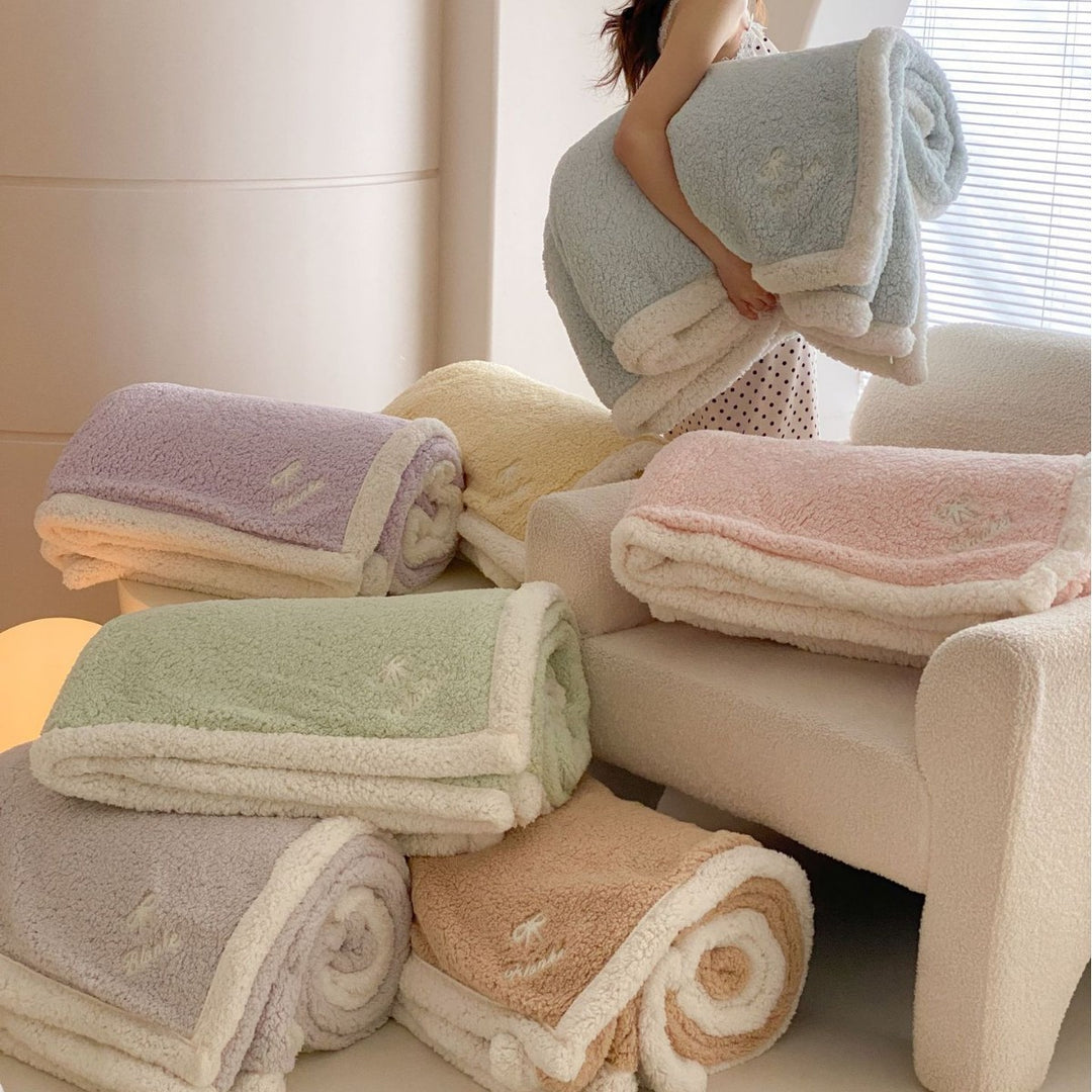Cozy Sherpa blanket with reversible fleece lining