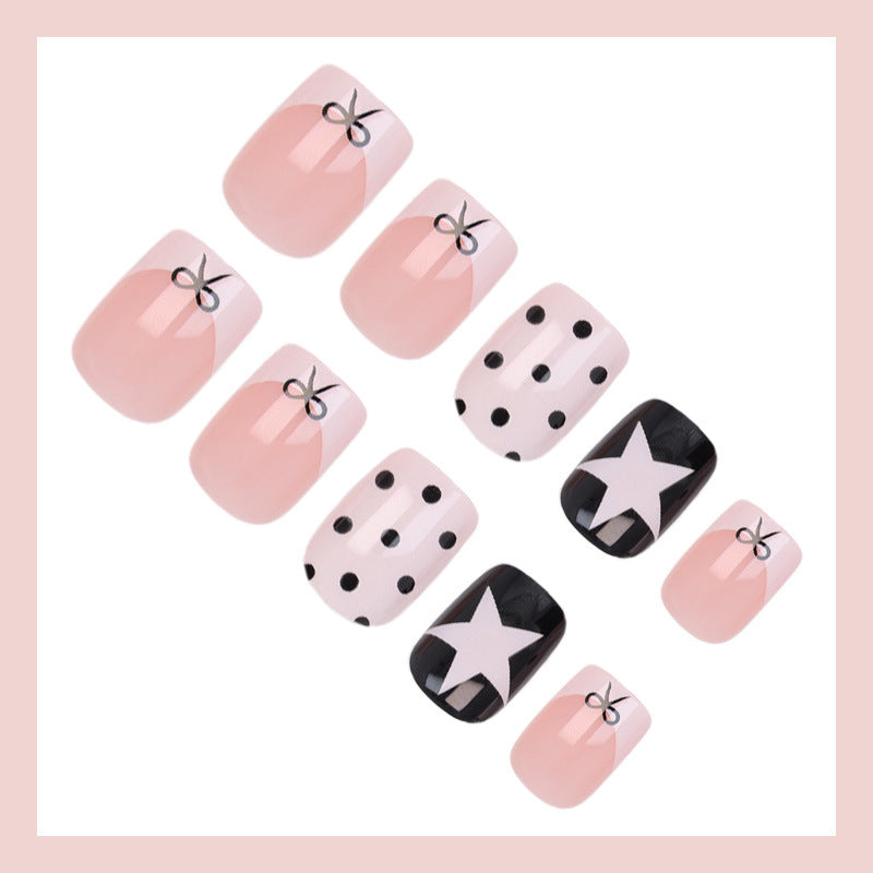Acrylic nail set with playful dots and star motifs Kalsten