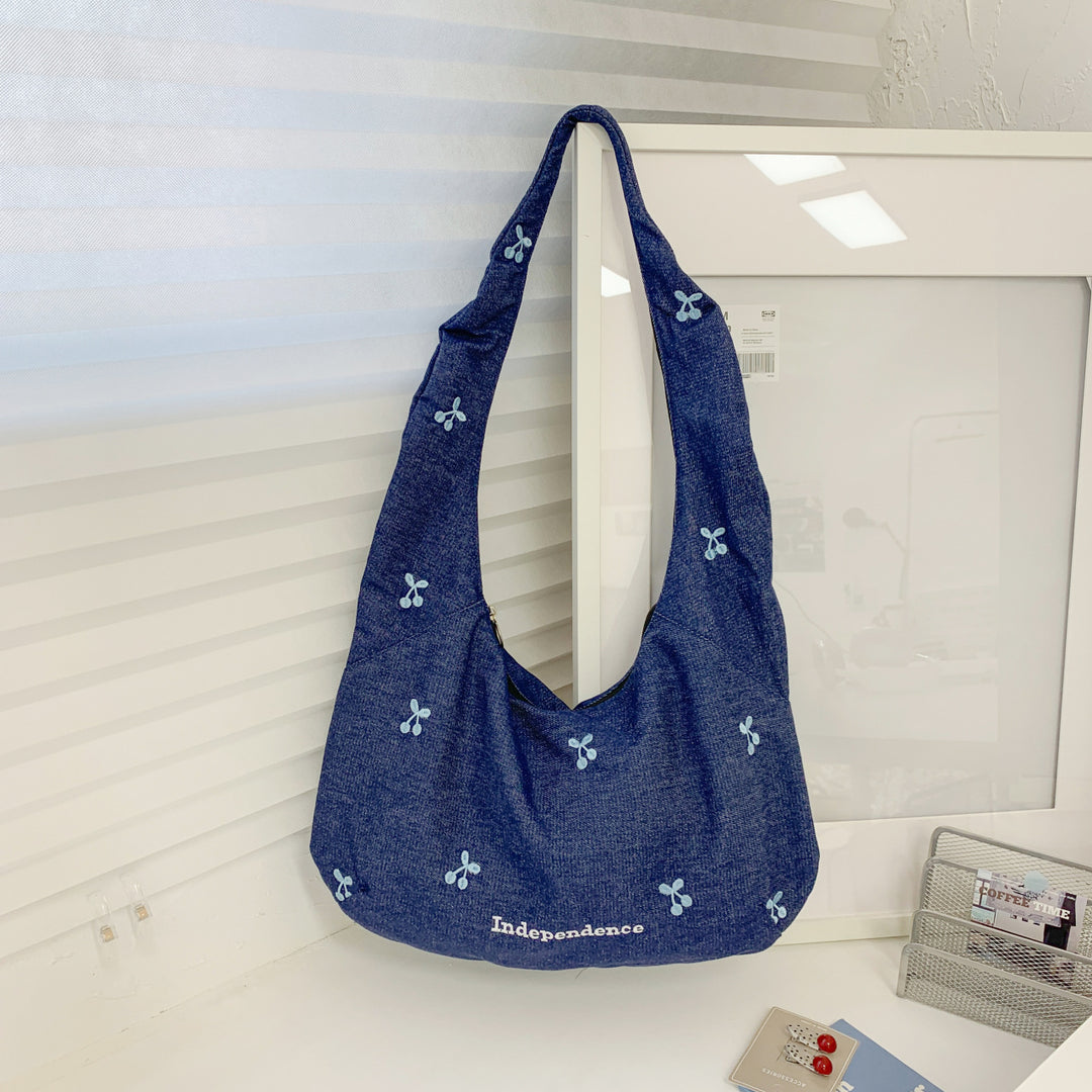 Comfortable shoulder bag with original embroidery motif Kalsten