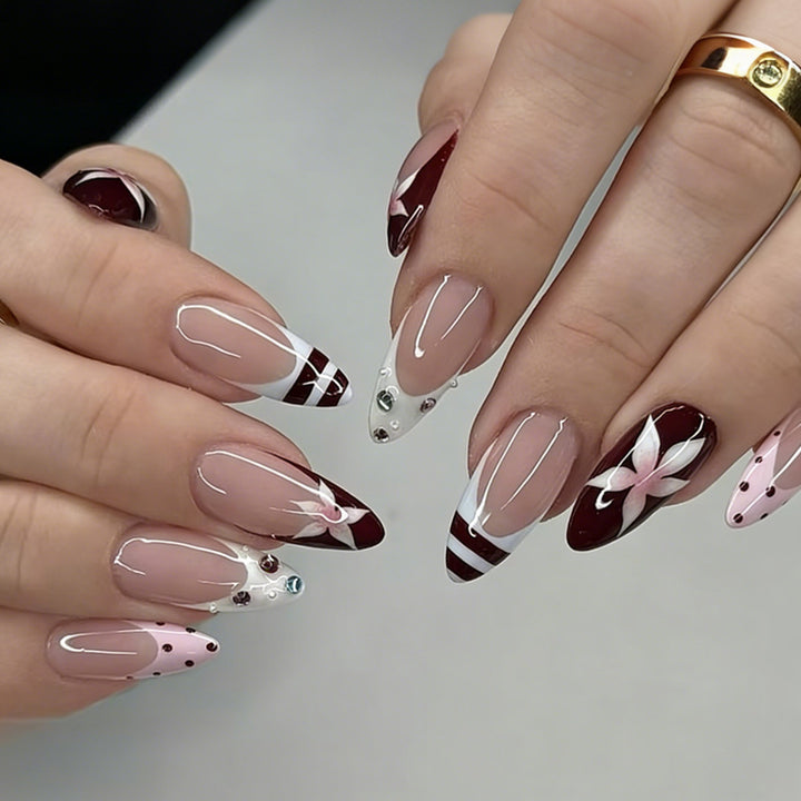 Artificial nail set with floral design and glitter accents Kalsten