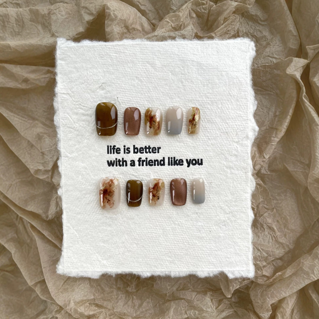 Artistic Press-On Nail Art Set with Elegant Earthy Patterns